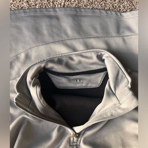 Small gray Under Armour cold gear.